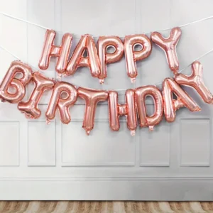 Ballons "Happy Birthday" en rose gold pour une fête élégante